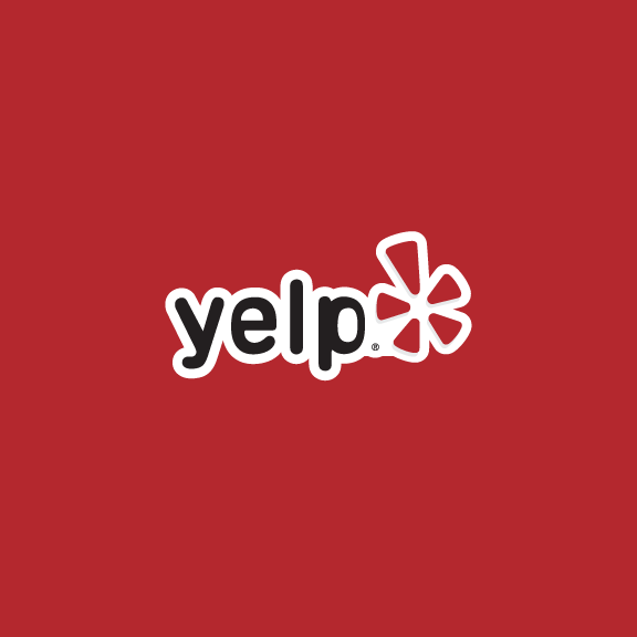 Yelp logo with red background.
