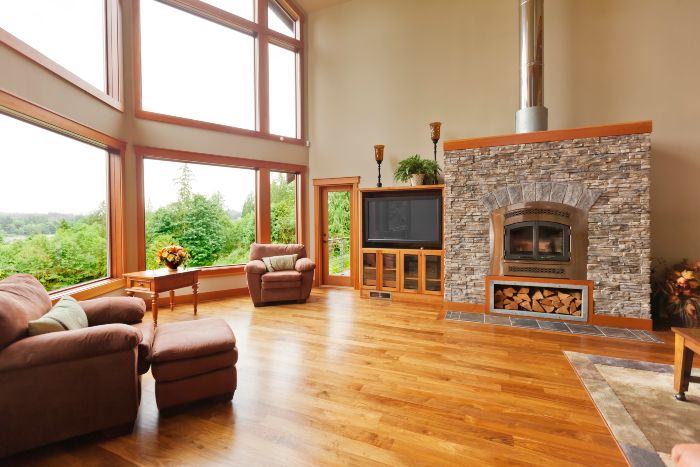 Spacious living room with stone fireplace.